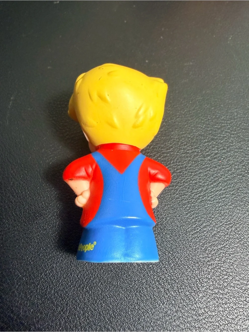 Fisher-Price Little People Smiling Push Lawn Mower with removable Blonde Driver